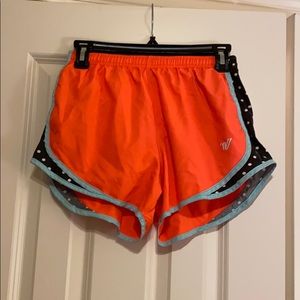 Orange Varsity athletic shorts